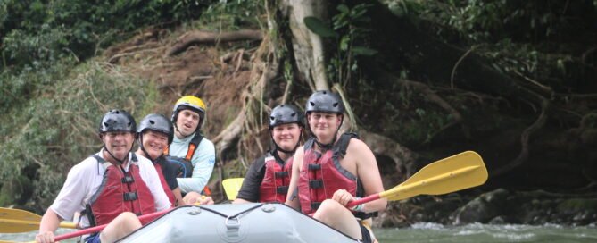 family raft floating